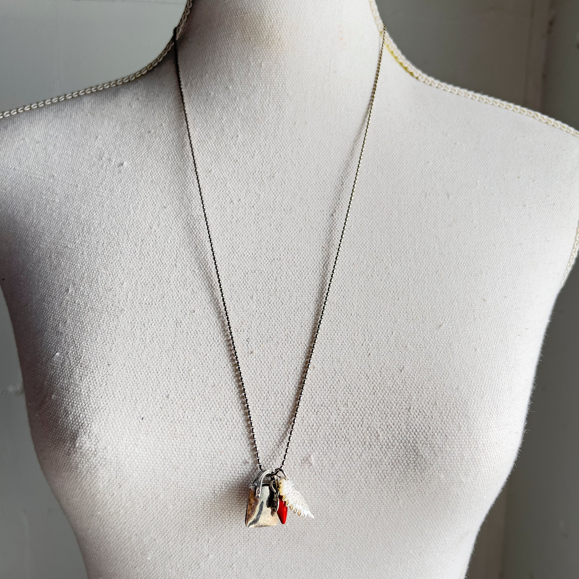 NK 24d21 tote bag necklace