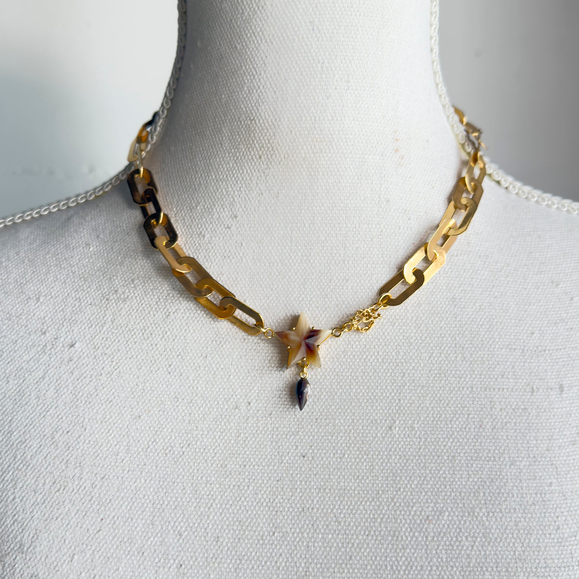 NK 25g14 Horn Star Necklace