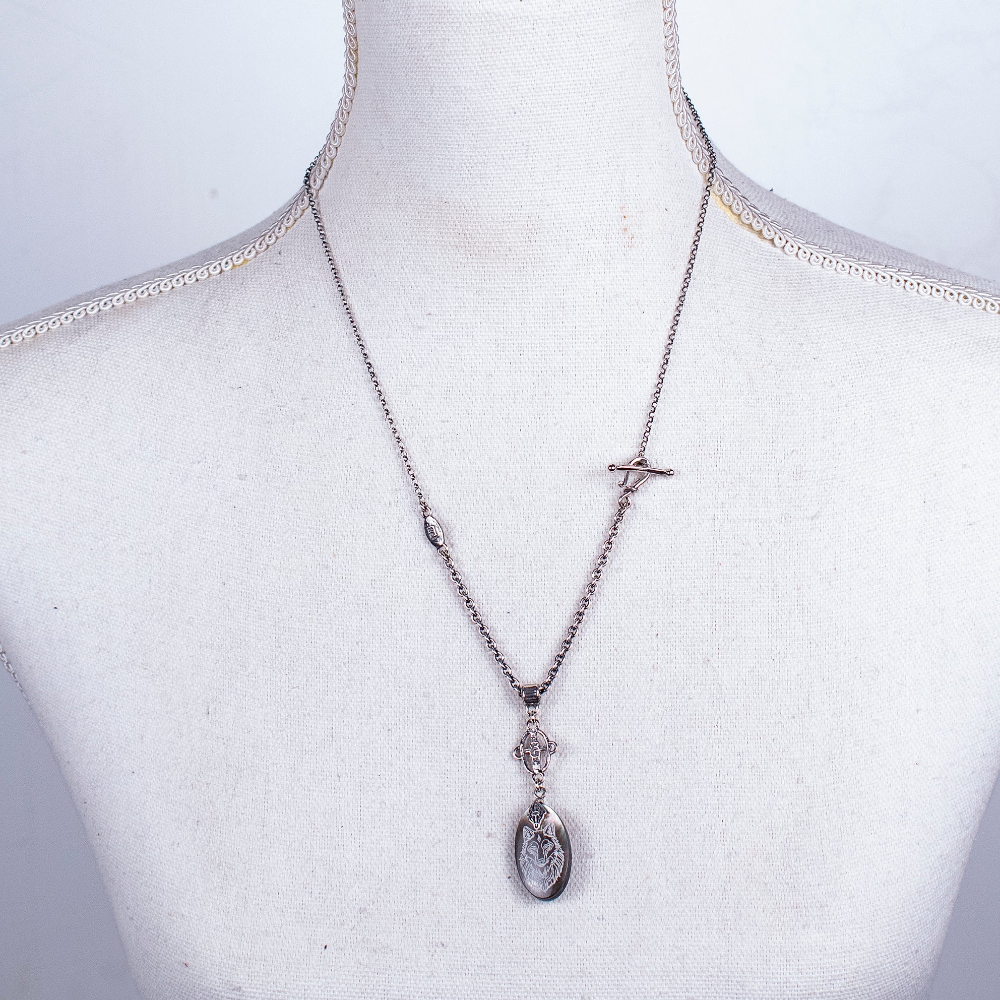 NK 26a20 Engraved Mother of Pearl "Wolf" Necklace