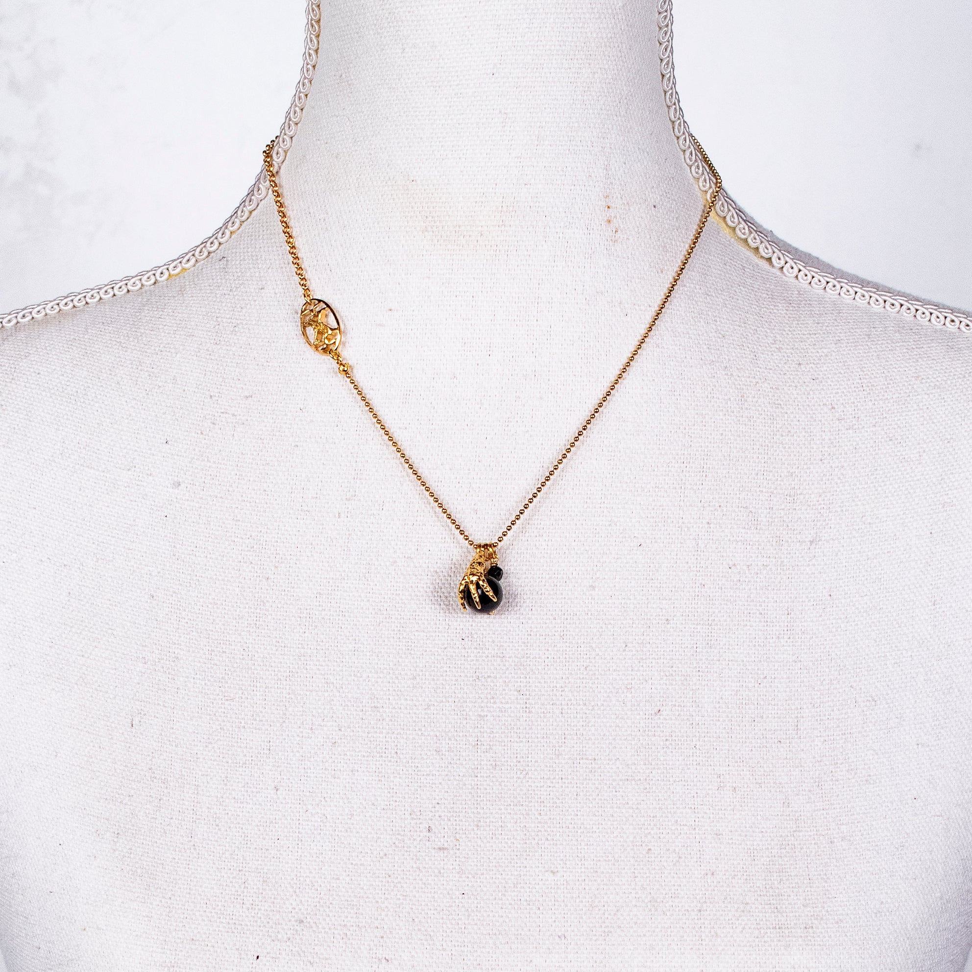 NK 26g10 black claw charm necklace