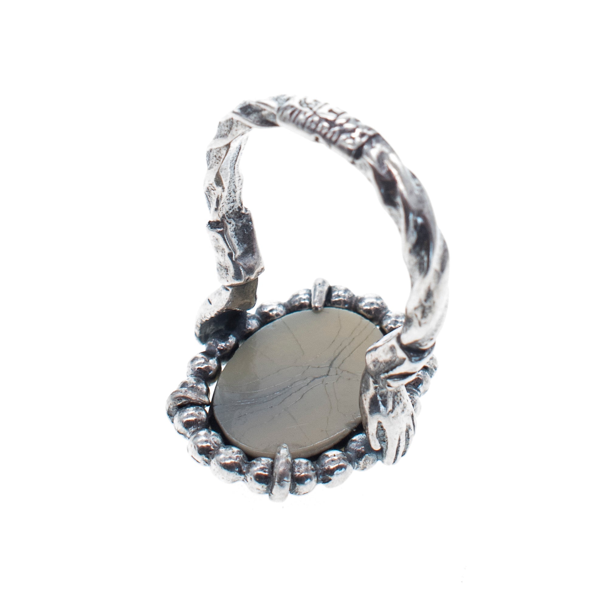R 25e11 Green oval cameo ring