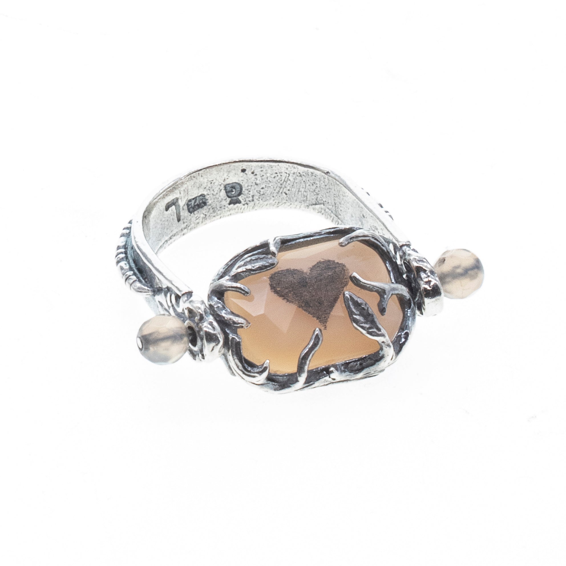 R 26a16 Rotating Hare & Heart Ring