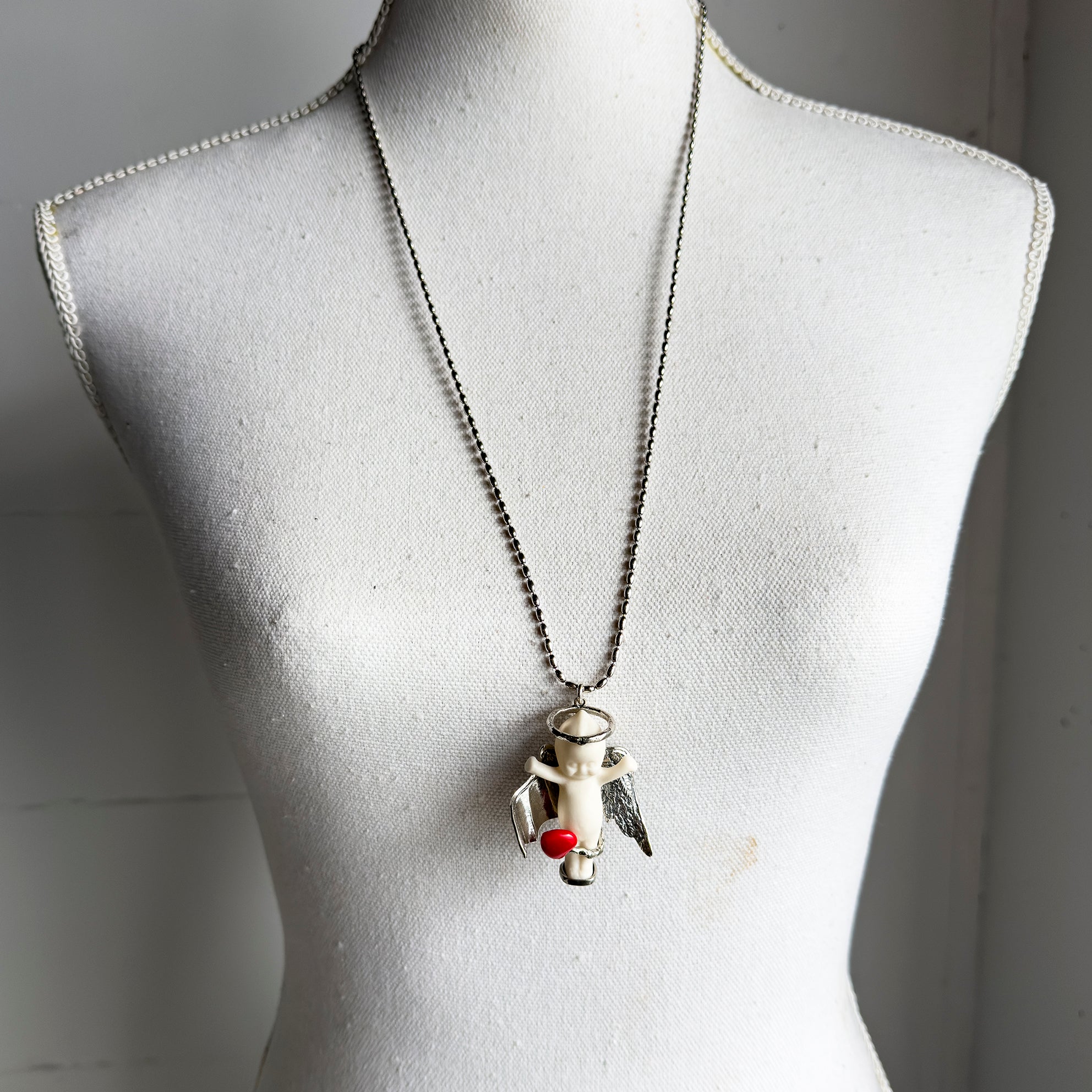 BS41A Happy Baby "Lucy in the sky" white and silver Necklace